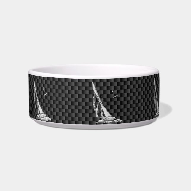 Comedero Cromado como barco de vela en fibra de carbono (Izquierda)