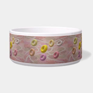 Comedero Pequeñas formas de donut en un fondo de malva nieb