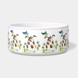 Comedero Perro con pájaro de aspecto caprichoso