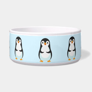 Comedero Pingüino moderno en blanco y negro sobre azul clar