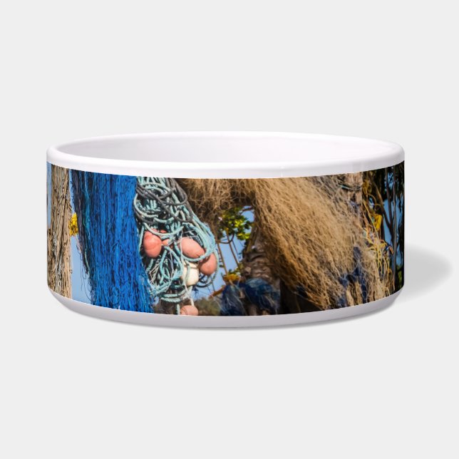 Comedero Redes de pesca que se secan en la playa (Derecha)