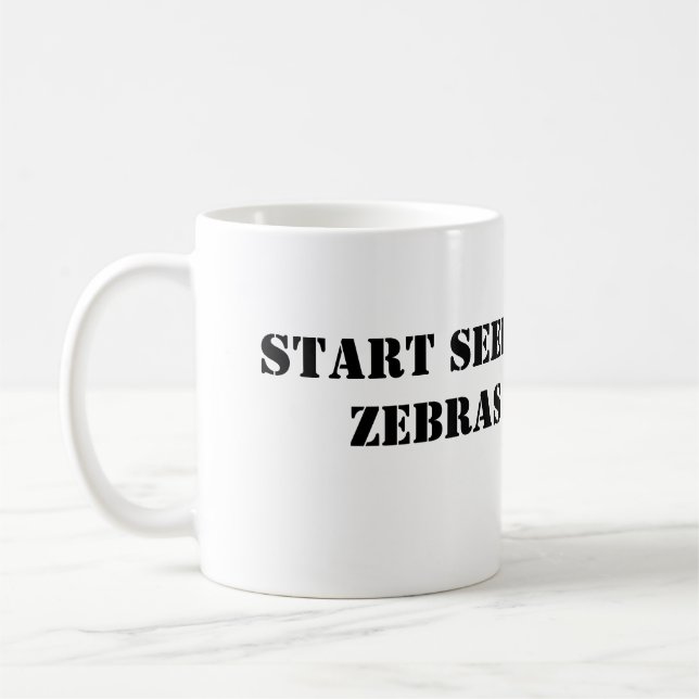 Comience a ver la taza de las cebras (Izquierda)
