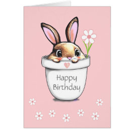 Conejito de cumpleaños y flores en rosa claro