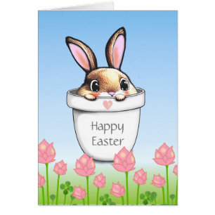 Conejito de Pascua lindo en una maceta y flores ro