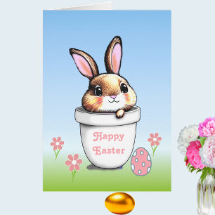 Conejito de Pascua y huevo de Pascua en azul claro