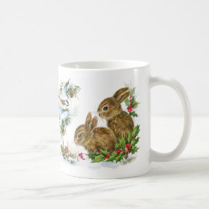 Conejitos y pájaros del invierno en la taza del