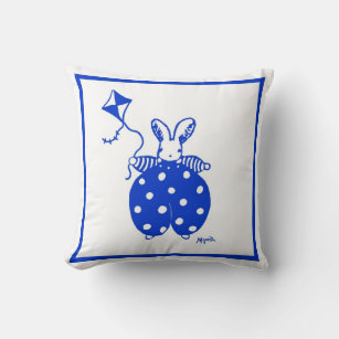 Conejo azul y amarillo con almohada de cometa