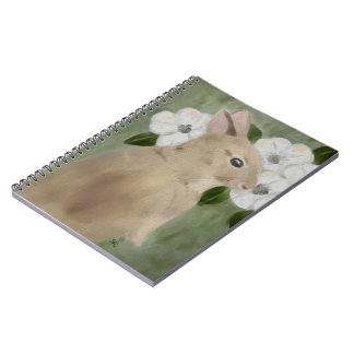 Conejo de conejito del bebé y cuaderno de las