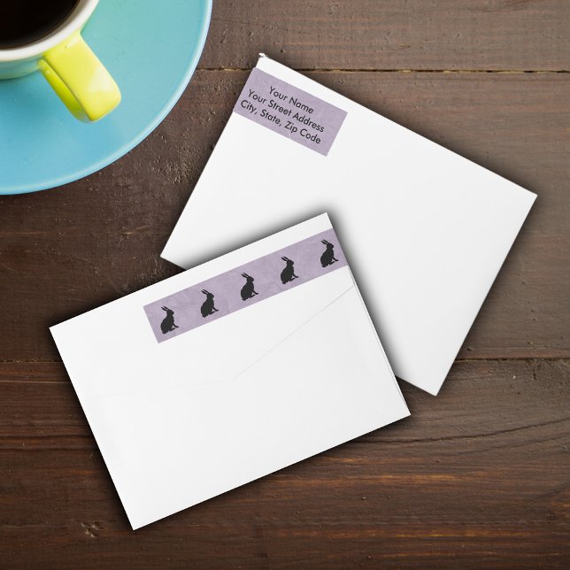 Conejo de Semana Santa de Conejo Negro (Row of black silhouette rabbits on marbled purple wrap around return address labels.)