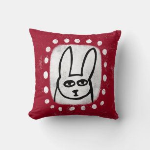 Conejo gracioso en Cojín decorativo rojo