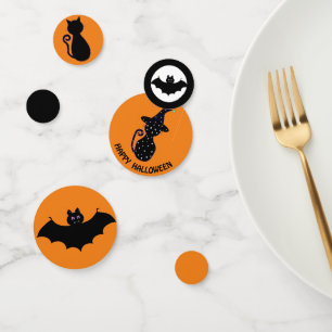 Confeti gatos negros y murciélagos voladores de Halloween