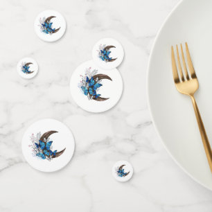 Confeti Mariposas azules sobre la media luna de madera