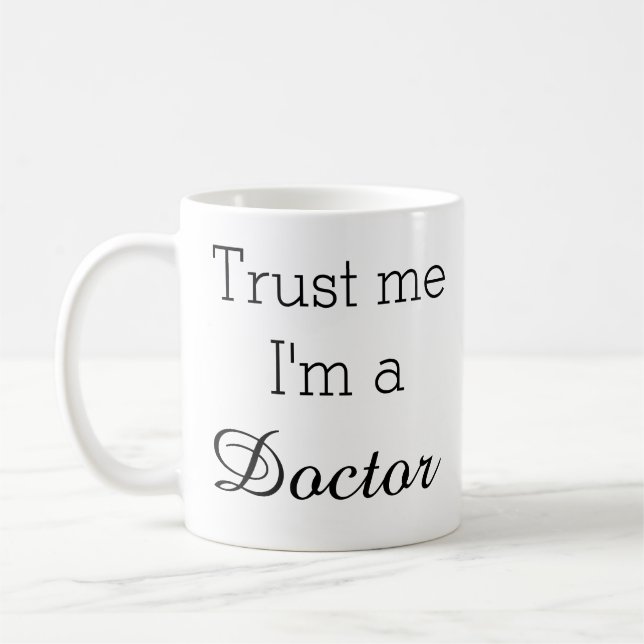 Confíe en que yo es una taza del médico (Izquierda)