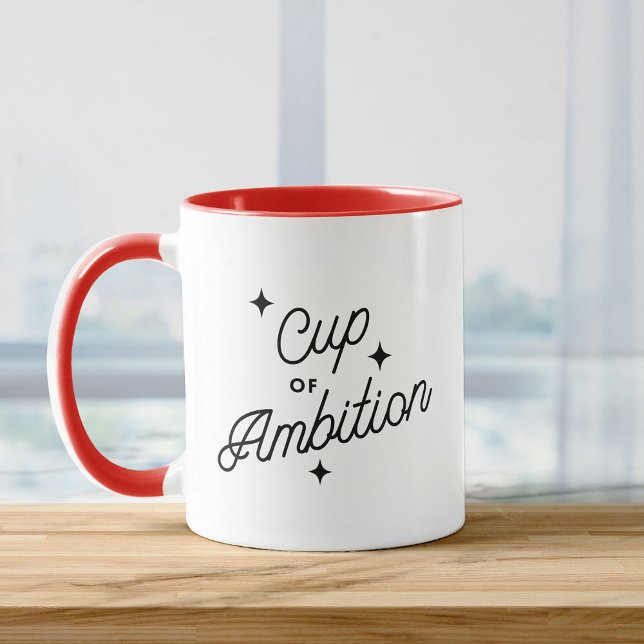 Copa de Ambición Nueva taza de empleo (White mug with red handle and interior, featuring "Cup of Ambition" text in black script with stars.)