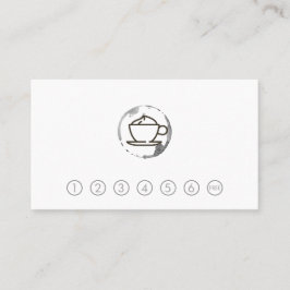 Copa de café y tarjeta de perforación de manchas