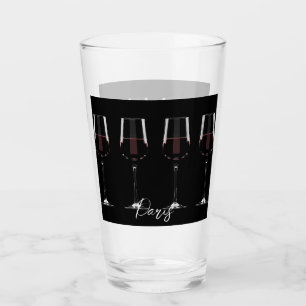 Copas de vino con vino tinto sobre negro