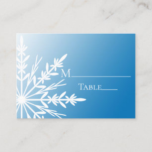 Copo de nieve blanco en tarjetas azules del lugar