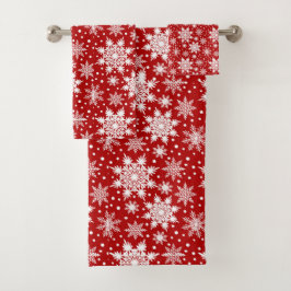 Copo de nieve blanco sobre patrón rojo tradicional