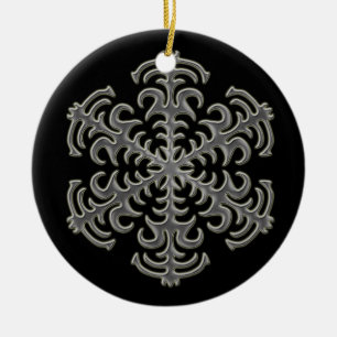 Copo de nieve de plata en el ornamento de cerámic
