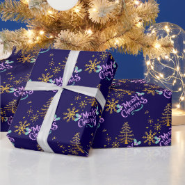 Copo de nieve dorado sobre papel de regalo azul