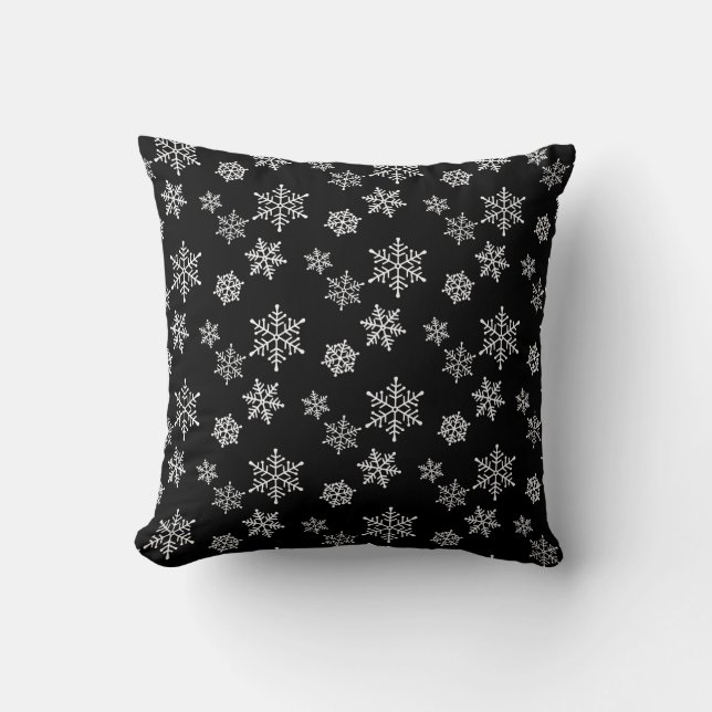Copos de nieve blancos en Cojín decorativo negro (Anverso)