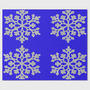 Copos de nieve con papel de envolver azul