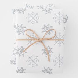 Copos de nieve con papel de envolver blanco