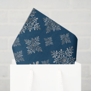 Copos de nieve de lámina gris falsa sobre azul (no