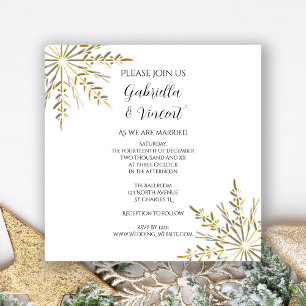 Copos de nieve dorados en la invitación a la boda