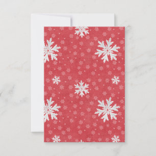 Copos de nieve en la invitación a los Navidades