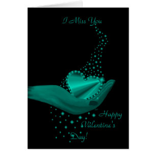 Corazón arcoiris en mano con estrellas