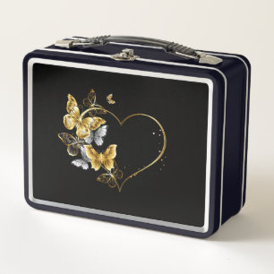 Corazón con mariposas doradas