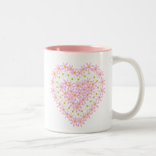 Corazón de la taza de las flores