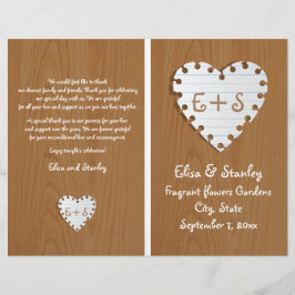 Corazón de papel en el programa de bodas plegadas 