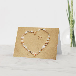 Corazón del Seashell con la tarjeta de las