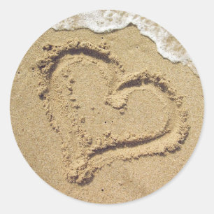 Corazón en las pegatinas de la boda de arena