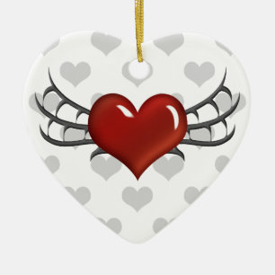 Corazón rojo, alas negras, ornamento gris de los