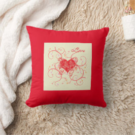 Corazón rojo con almohada de fondo rojo