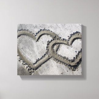 Corazones de amor de arena envueltas lienzo