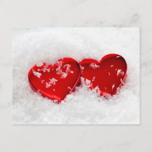 Corazones de amor en postal de nieve