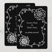 Corazones de flores blancas en invitaciones a la b