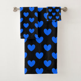 Corazones de polka azul sobre negro