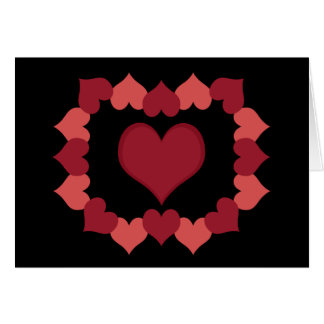 Corazones en tarjeta negra