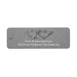 Corazones entrelazados en etiquetas de dirección d