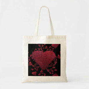 Corazones rojos flotantes una bolsa de asas del