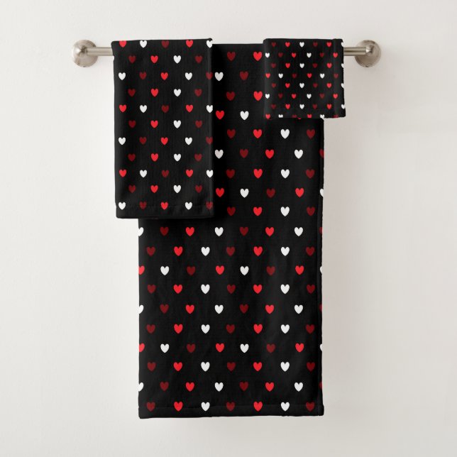 corazones rojos y blancos sobre negro (In situ)