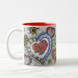 Corazones y taza de las flores