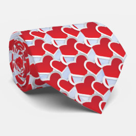 Corbata 2 corazones rojos sobre la textura de mármol azul