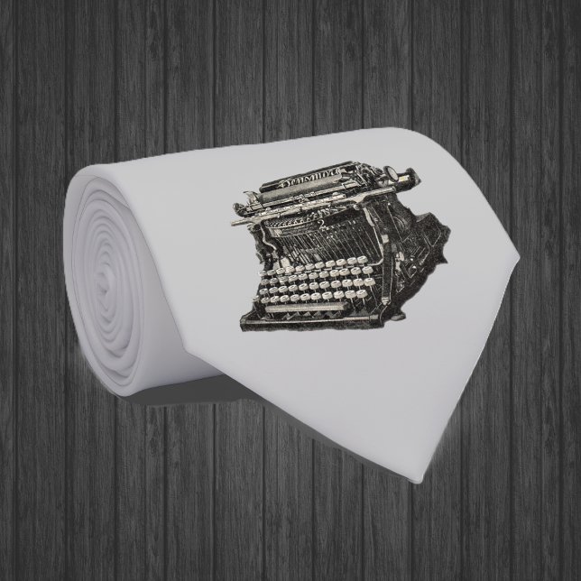Corbata Antigua vieja máquina de escribir de moda (Black vintage manual typewriter on light grey neck tie.)