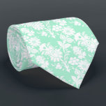 Corbata Boda de moda Neo Mint Floral Pattern Groomsmen<br><div class="desc">Este corbata de abadejo de los padrinos tiene un patrón floral blanco sobre un fondo neonormentario de moda.</div>